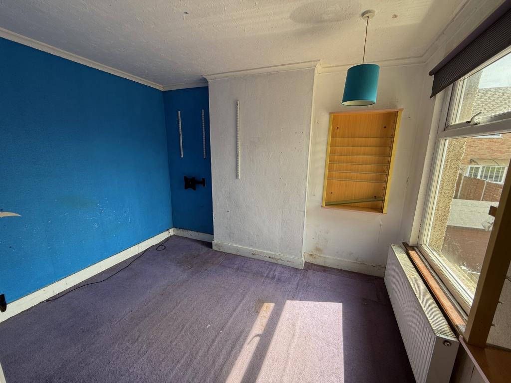 Lot: 139 - END-TERRACE HOUSE FOR IMPROVEMENT - Bedroom 2 with window to the rear